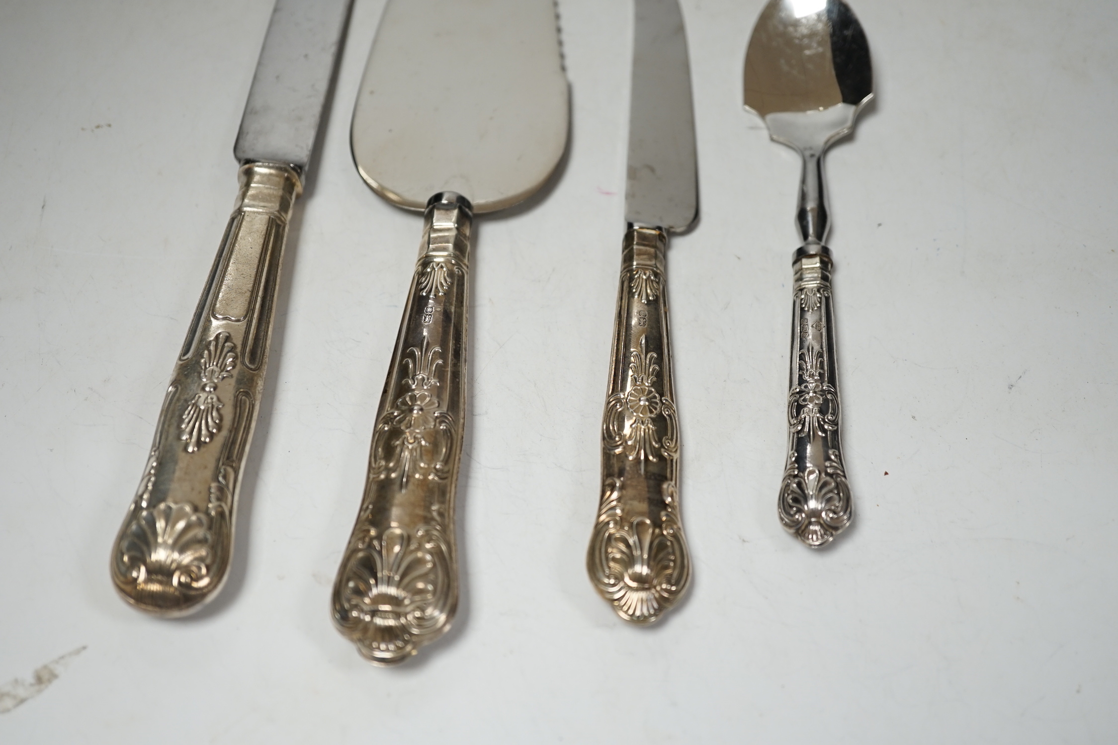 A set of six modern silver handled King's pattern table knives, five other silver handled items of cutlery and eleven silver plated handled King's pattern table knives.